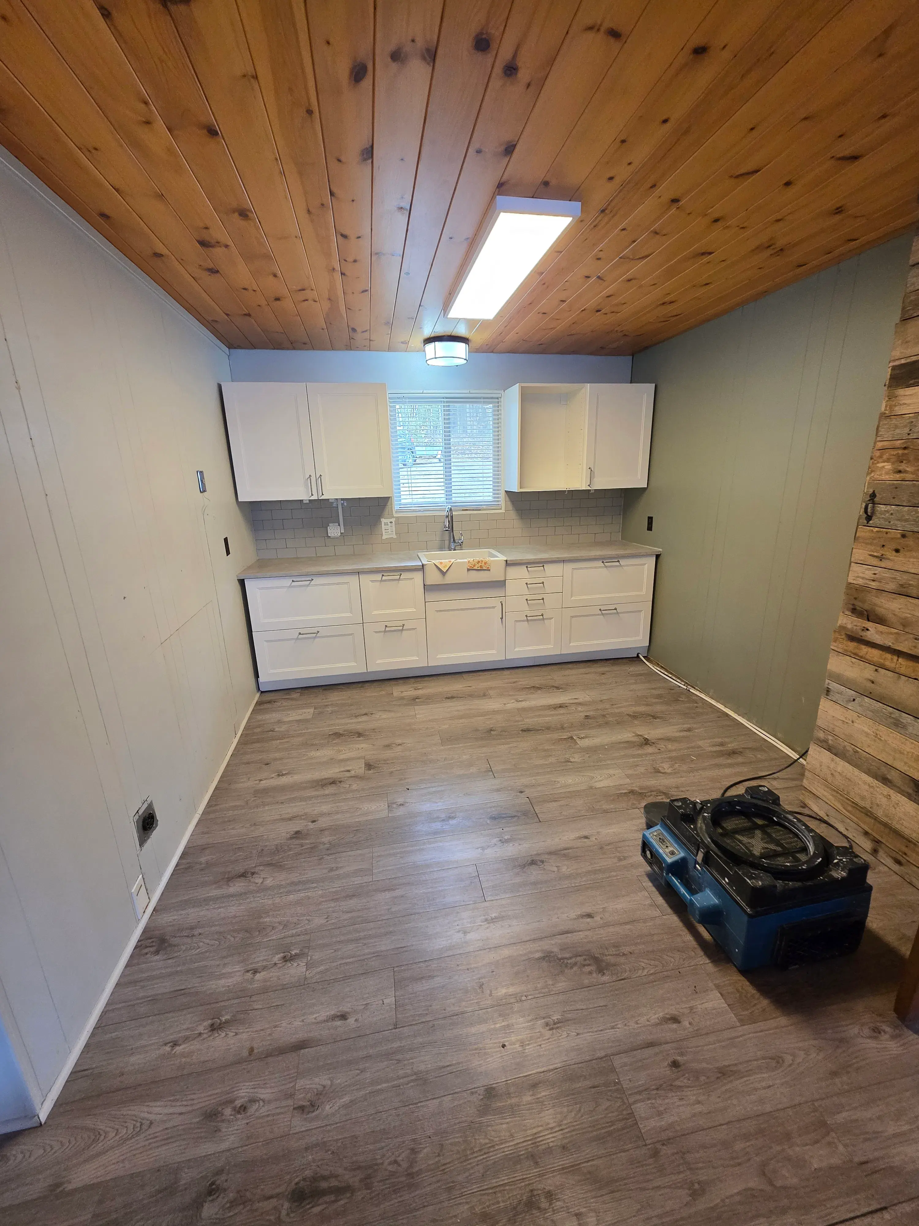 IKEA kitchen assembly with a custom-fitted laminate countertop