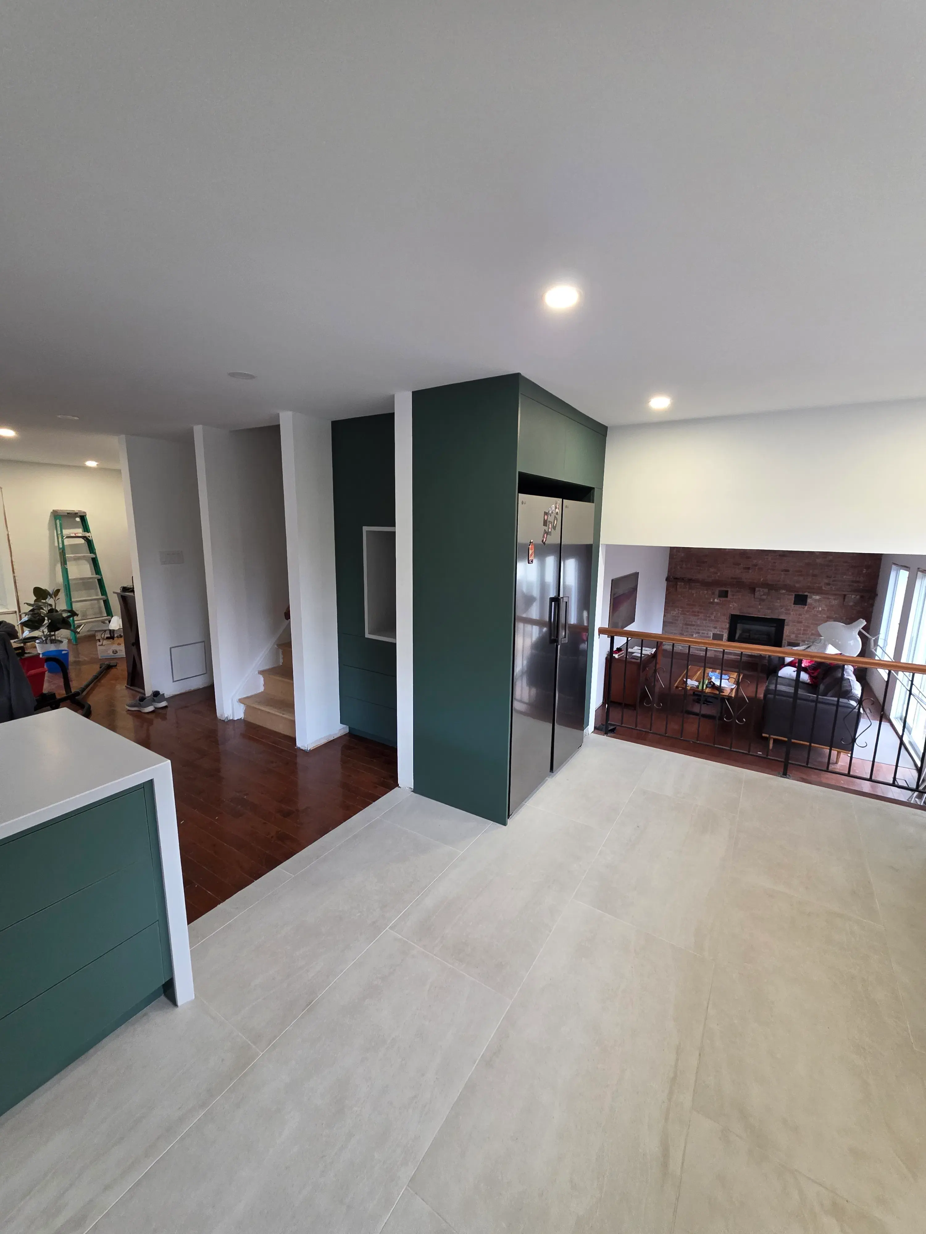 Completed Orleans custom kitchen with coordinated cabinetry and countertop