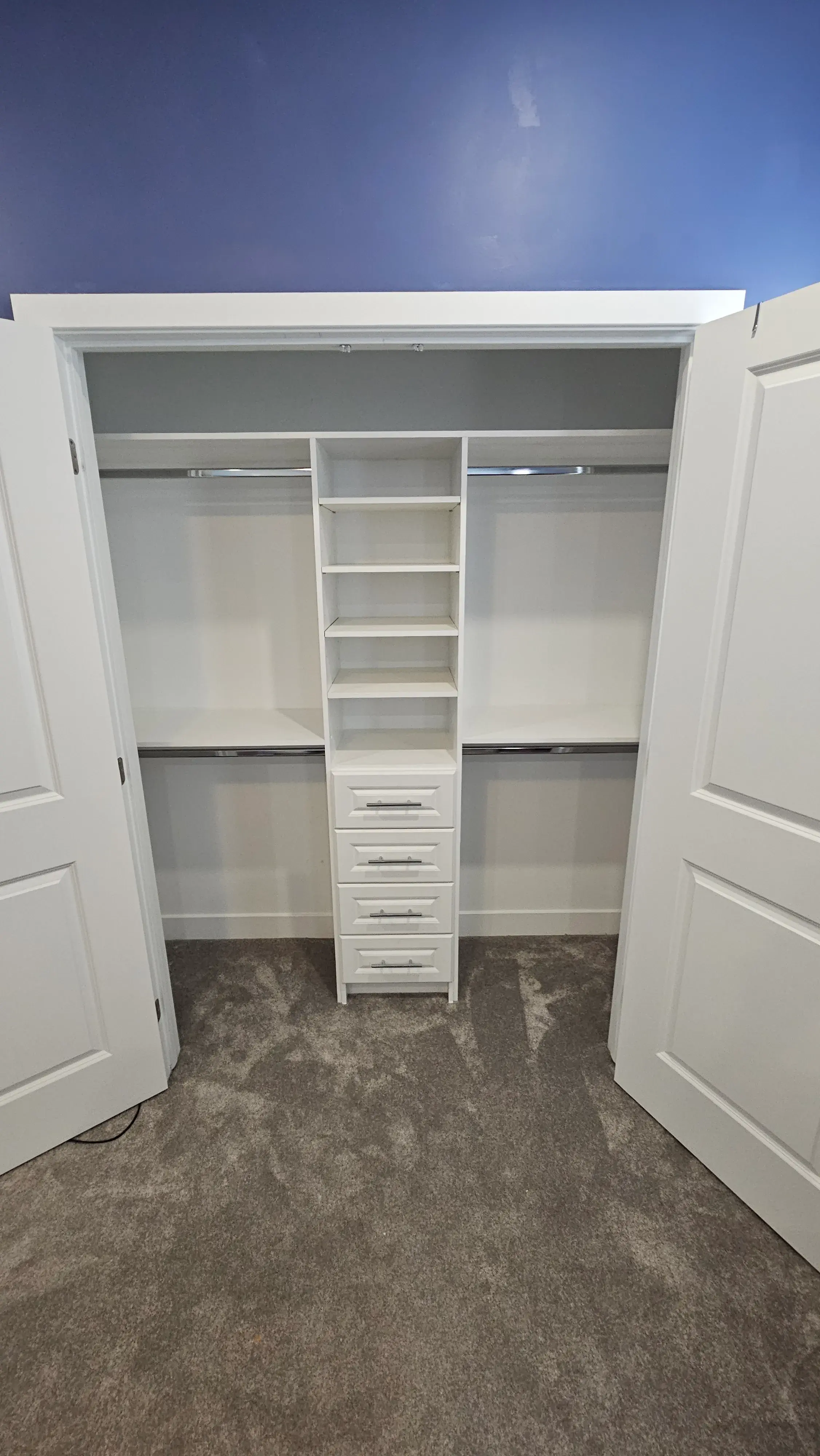 Custom reach-in closet built for a Barrhaven home