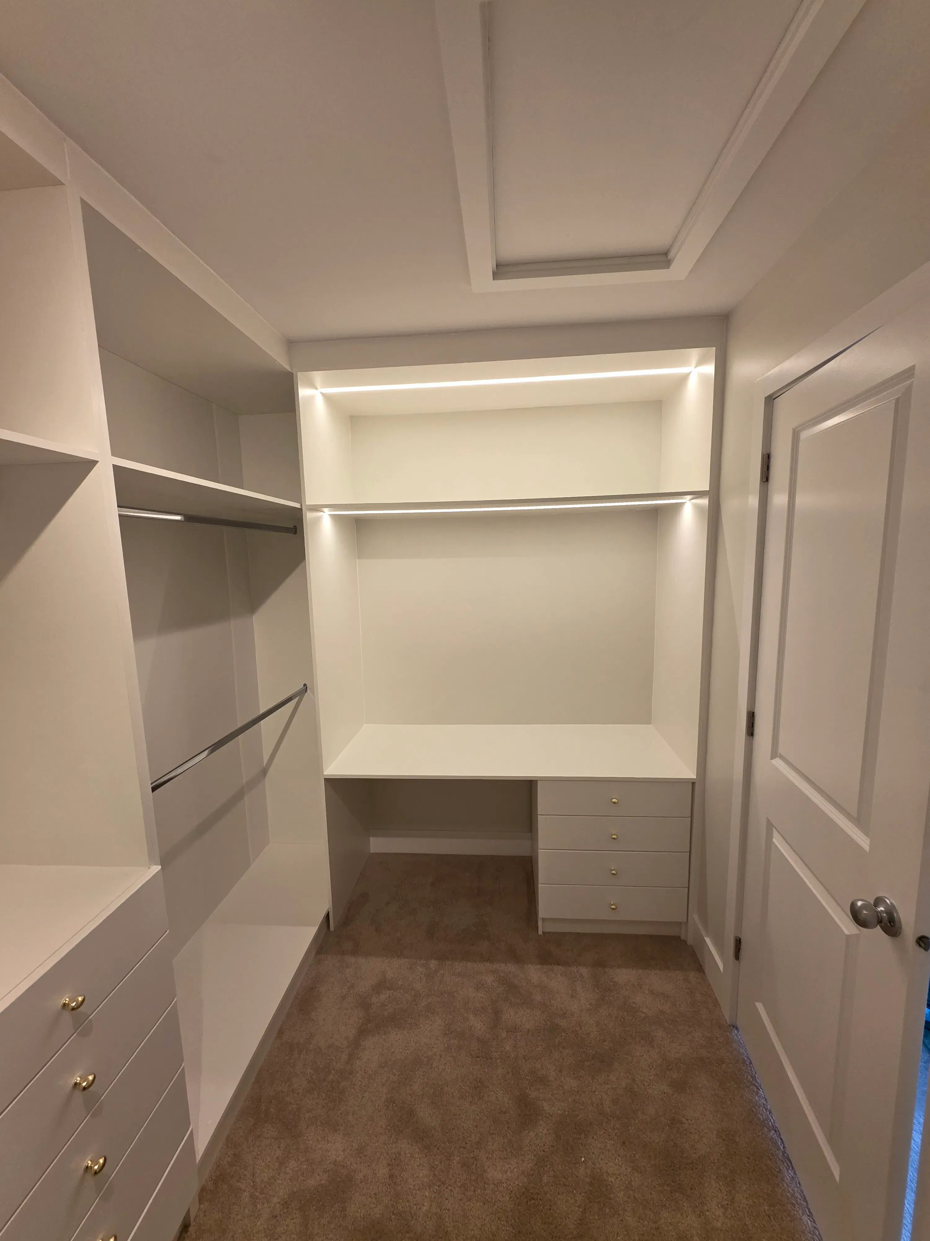 Custom walk-in closet with tailored storage zones